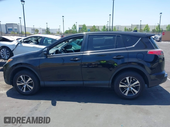 2018 Toyota RAV4 XLE z VIN 2T3WFREV1JW450514, wystawiony jako IAAI lot #42291018 z przebiegiem 89 370 mil mil oraz . Historia ofert i sprzedaży dostępna na DreamBid. Obrazek 15.