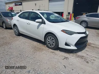 2018 Toyota Corolla L with VIN 2T1BURHE5JC101043, listed as a IAAI auction lot 42446168 with 154,886 mi miles and . Bid and sale history available at DreamBid. Image 1.