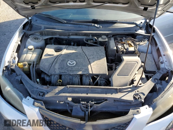 2004 Mazda 3 i with VIN JM1BK12F141168532, listed as a Copart auction lot 43964885 with 266,411 mi miles and Salvage Title. Bid and sale history available at DreamBid. Image 13.