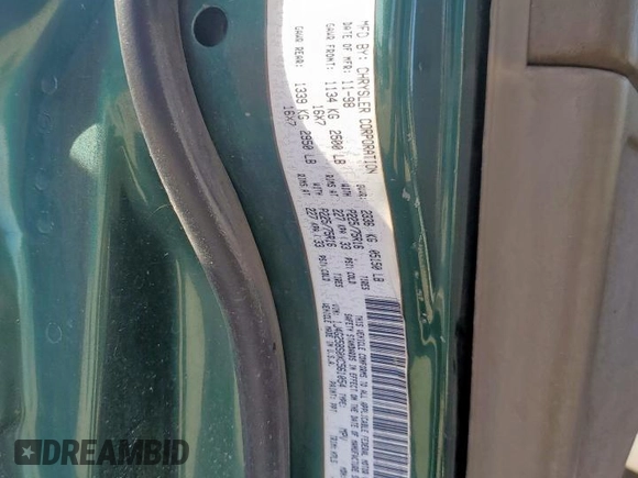 1999 Jeep Grand Cherokee Laredo with VIN 1J4G258S0XC561054, listed as a Copart auction lot 49814555 with Not provided miles and Salvage title. Bid and sale history available at DreamBid. Image 13.