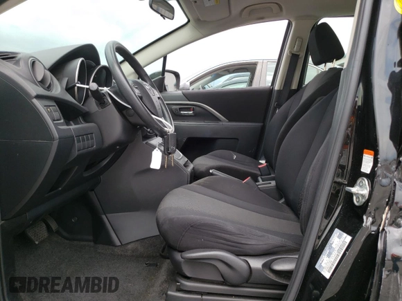2012 Mazda 5 Sport z VIN JM1CW2BL2C0123866, wystawiony jako Copart lot #68786254 z przebiegiem 99 553 mil mil oraz Szkoda całkowita • Salvage title. Historia ofert i sprzedaży dostępna na DreamBid. Obrazek 7.