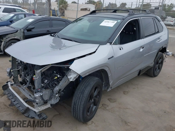 2021 Toyota RAV4 Hybrid XSE z VIN 4T3E6RFV9MU027713, wystawiony jako IAAI lot #42587759 z przebiegiem 28 806 mil mil oraz . Historia ofert i sprzedaży dostępna na DreamBid. Obrazek 2.