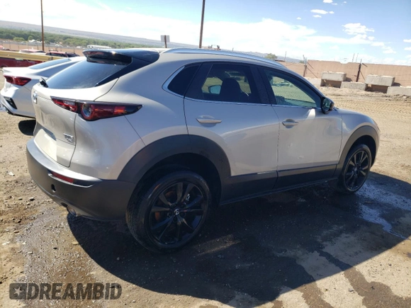 2022 Mazda CX-30 2.5 Turbo with VIN 3MVDMBAY1NM447753, listed as a Copart auction lot 68148334 with 5,180 mi miles and Salvage Title. Bid and sale history available at DreamBid. Image 3.