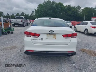 2017 Kia Optima LX z VIN 5XXGT4L32HG161091, wystawiony jako IAAI lot #42266149 z przebiegiem 166 254 mil mil oraz . Historia ofert i sprzedaży dostępna na DreamBid. Obrazek 16.