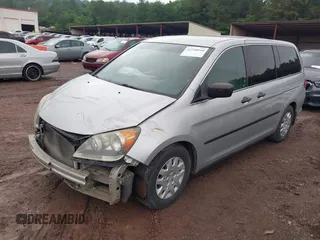 2010 Honda Odyssey LX with VIN 5FNRL3H21AB100181, listed as a IAAI auction lot 42258010 with 246,463 mi miles and . Bid and sale history available at DreamBid. Image 2.