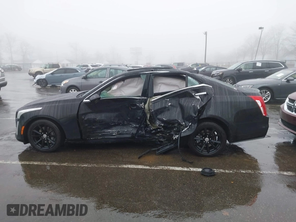 2017 Cadillac CTS AWD with VIN 1G6AW5SX1H0192666, listed as a IAAI auction lot 41554014 with 90,753 mi miles and . Bid and sale history available at DreamBid. Image 13.