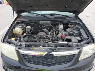 2008 Mazda Tribute Grand Touring with VIN 4F2CZ02Z48KM26109, listed as a IAAI auction lot 42011447 with 221,686 mi miles. Bid and sale history available at carsss.com. Image 10.