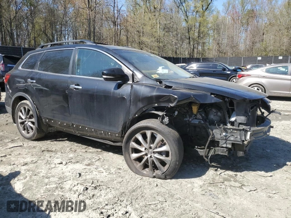 2015 Mazda CX-9 Grand Touring with VIN JM3TB3DV7F0448203, listed as a Copart auction lot 52254895 with 127,141 mi miles and Salvage title. Bid and sale history available at DreamBid. Image 4.