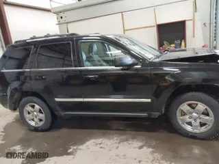 2007 Jeep Grand Cherokee Limited with VIN 1J8HR58287C572544, listed as a IAAI auction lot 41366475 with 231,151 mi miles. Bid and sale history available at carsss.com. Image 13.