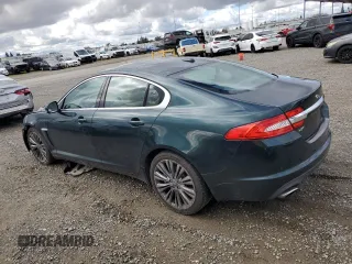 2012 Jaguar XF Portfolio with VIN SAJWA0HB4CLS49225, listed as a Copart auction lot 48070445 with 61,059 mi miles and Salvage Title. Bid and sale history available at carsss.com. Image 2.