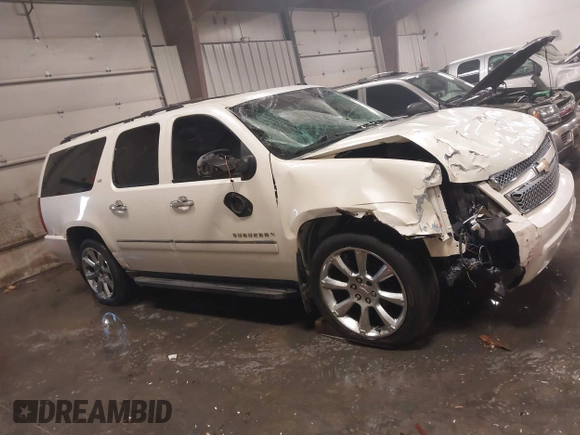 2010 Chevrolet Suburban LTZ with VIN 1GNUKKE32AR271253, listed as a IAAI auction lot 41161374 with 164,184 mi miles. Bid and sale history available at carsss.com. Image 13.