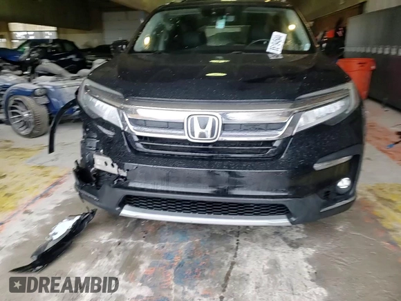 2020 Honda Pilot Touring 8-Passenger with VIN 5FNYF6H90LB043055, listed as a Copart auction lot 85194544 with 82,144 mi miles and Salvage Title. Bid and sale history available at DreamBid. Image 12.