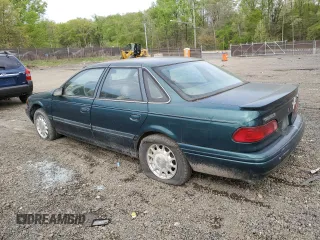 1995 Ford Taurus GL with VIN 1FALP52U8SA179395, listed as a Copart auction lot 53614265 with 71,082 mi miles and Salvage title. Bid and sale history available at DreamBid. Image 2.