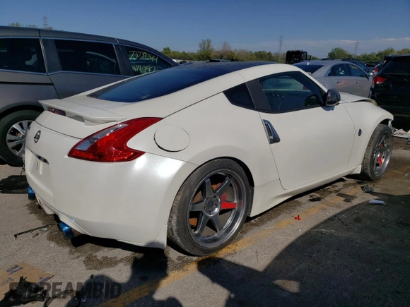 2013 Nissan 370Z with VIN JN1AZ4EH4DM384057, listed as a Copart auction lot 73185154 with 103,939 mi miles and Clean Title. Bid and sale history available at carsss.com. Image 3.