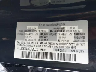 2025 Mazda CX-90 Premium Sport z VIN JM3KKCHD3S1218675, wystawiony jako IAAI lot #41971539 z przebiegiem Nie podano mil oraz . Historia ofert i sprzedaży dostępna na DreamBid. Obrazek 9.