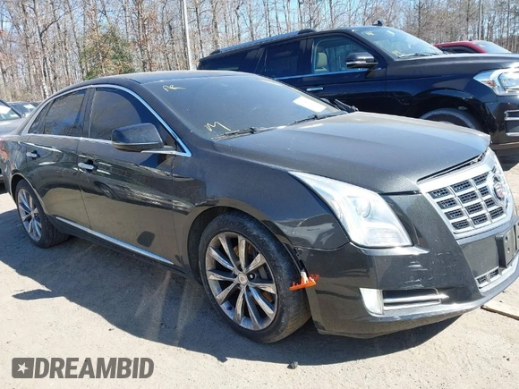 2013 Cadillac XTS Luxury z VIN 2G61R5S33D9184878, wystawiony jako IAAI lot #41644213 z przebiegiem 113 293 mil mil oraz . Historia ofert i sprzedaży dostępna na DreamBid. Obrazek 1.