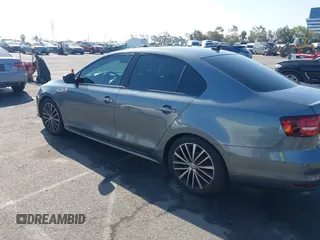 2016 Volkswagen Jetta Sport z VIN 3VWD17AJ5GM231530, wystawiony jako IAAI lot #41968152 z przebiegiem 85 474 mil mil oraz . Historia ofert i sprzedaży dostępna na DreamBid. Obrazek 14.