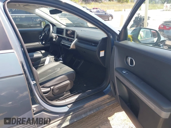 2023 Hyundai Ioniq 5 SEL with VIN KM8KNDAF2PU217648, listed as a IAAI auction lot 42687579 with 15,226 mi miles and . Bid and sale history available at DreamBid. Image 5.