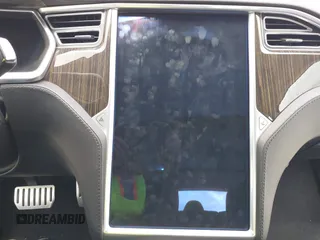 2014 Tesla Model S 60 with VIN 5YJSA1H17EFP30148, listed as a IAAI auction lot 39188024 with Not Provided miles and . Bid and sale history available at DreamBid. Image 14.