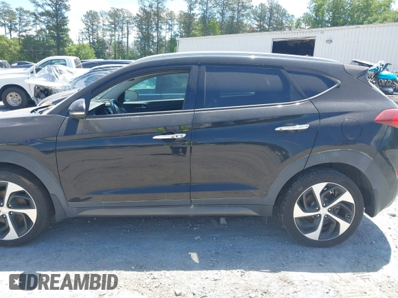 2016 Hyundai Tucson Limited with VIN KM8J33A2XGU195973, listed as a IAAI auction lot 42198560 with 111,181 mi miles. Bid and sale history available at carsss.com. Image 14.