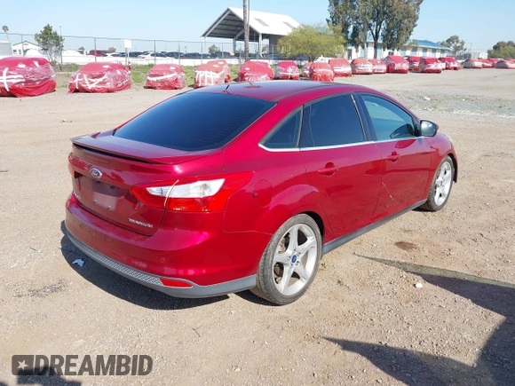2014 Ford Focus Titanium with VIN 1FADP3J2XEL247827, listed as a IAAI auction lot 41959720 with 105,373 mi miles. Bid and sale history available at carsss.com. Image 4.