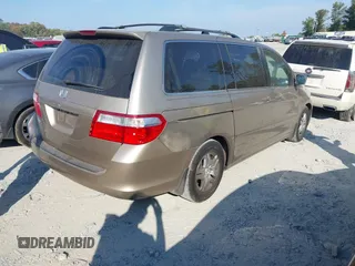 2007 Honda Odyssey EX with VIN 5FNRL38437B074662, listed as a IAAI auction lot 40716076 with 228,344 mi miles. Bid and sale history available at carsss.com. Image 4.