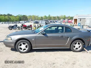 2004 Ford Mustang Standard z VIN 1FAFP40644F236905, wystawiony jako IAAI lot #42016081 z przebiegiem 167 733 mil mil oraz . Historia ofert i sprzedaży dostępna na DreamBid. Obrazek 14.
