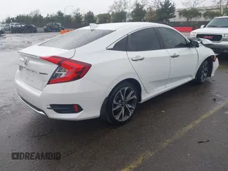 2020 Honda Civic Sedan Touring with VIN 19XFC1F91LE210390, listed as a IAAI auction lot 41766652 with 67,269 mi miles. Bid and sale history available at carsss.com. Image 4.