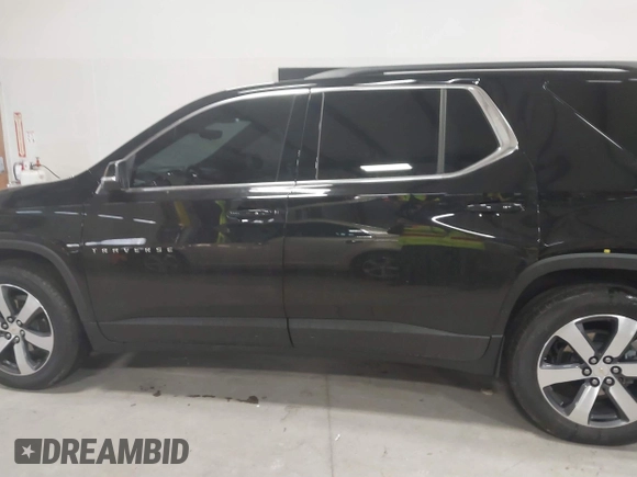 2022 Chevrolet Traverse LT with VIN 1GNEVHKW3NJ124361, listed as a IAAI auction lot 41033053 with 27,869 mi miles and . Bid and sale history available at DreamBid. Image 14.