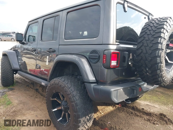 2019 Jeep Wrangler Unlimited Sahara with VIN 1C4HJXEG7KW661801, listed as a IAAI auction lot 40848731 with Not provided miles and . Bid and sale history available at DreamBid. Image 3.