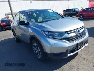 2019 Honda CR-V LX z VIN 5J6RW6H31KL003721, wystawiony jako IAAI lot #42087703 z przebiegiem 74 387 mil mil oraz . Historia ofert i sprzedaży dostępna na DreamBid. Obrazek 1.