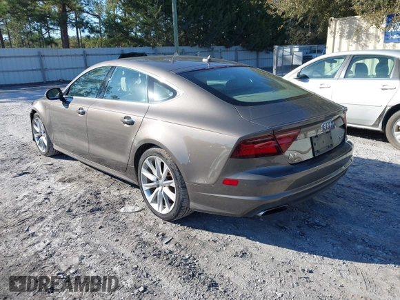 2016 Audi A7 3.0 Premium Plus with VIN WAUWGAFC2GN105498, listed as a IAAI auction lot 41488062 with 120,393 mi miles. Bid and sale history available at carsss.com. Image 3.