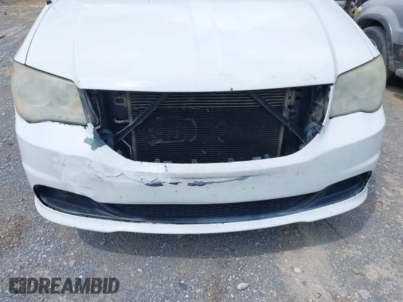 2014 Dodge Grand Caravan SXT with VIN 2C4RDGCG8ER264027, listed as a IAAI auction lot 42018350 with 311,876 mi miles and . Bid and sale history available at DreamBid. Image 6.