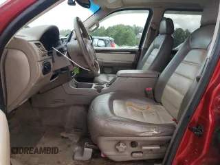 2003 Ford Explorer Eddie Bauer with VIN 1FMDU74K93UB13996, listed as a Copart auction lot 69265234 with 329,165 mi miles and Salvage title. Bid and sale history available at DreamBid. Image 7.