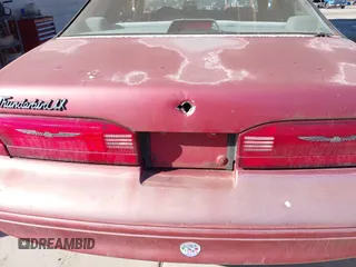 1997 Ford Thunderbird LX with VIN 1FALP6247VH138208, listed as a IAAI auction lot 41562980 with 135,204 mi miles and . Bid and sale history available at DreamBid. Image 6.