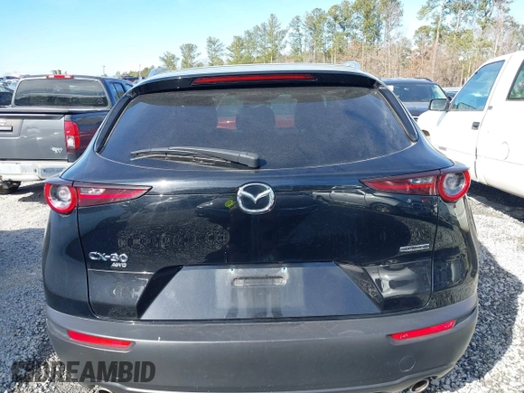 2023 Mazda CX-30 S Premium with VIN 3MVDMBDM7PM528297, listed as a IAAI auction lot 41637542 with 48,935 mi miles and . Bid and sale history available at DreamBid. Image 16.
