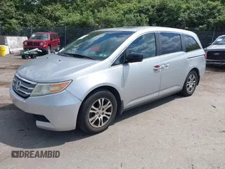 2012 Honda Odyssey EX-L with VIN 5FNRL5H67CB139701, listed as a IAAI auction lot 42233283 with 147,143 mi miles and . Bid and sale history available at DreamBid. Image 18.