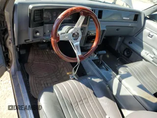 1987 GMC Caballero z VIN 3GTCW80HXHS801811, wystawiony jako Copart lot #46690684 z przebiegiem 63 004 mil mil oraz Nie do naprawy. Historia ofert i sprzedaży dostępna na DreamBid. Obrazek 8.