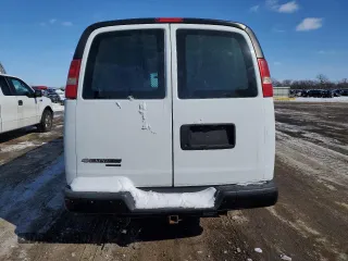 2014 Chevrolet Express Cargo Van with VIN 1GCWGGFA9E1105801, listed as a Copart auction lot 45789185 with 117,119 mi miles and Salvage Title. Bid and sale history available at carsss.com. Image 6.