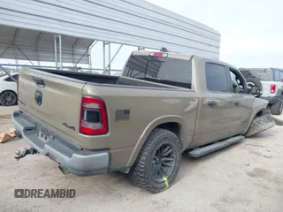 2020 Ram 1500 Big Horn with VIN 1C6SRFFT0LN301093, listed as a IAAI auction lot 41607746 with 65,223 mi miles and . Bid and sale history available at DreamBid. Image 4.