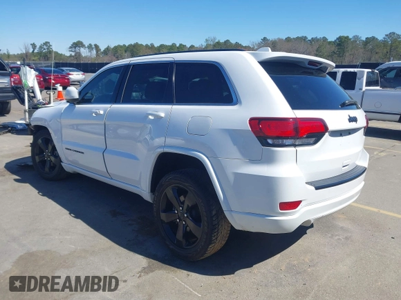 2015 Jeep Grand Cherokee Altitude with VIN 1C4RJEAG4FC815743, listed as a IAAI auction lot 41815095 with 106,867 mi miles. Bid and sale history available at carsss.com. Image 3.