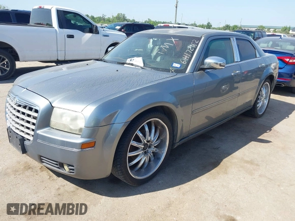 2006 Chrysler 300 Touring with VIN 2C3KA53G06H172162, listed as a IAAI auction lot 42005963 with 209,549 mi miles. Bid and sale history available at carsss.com. Image 2.