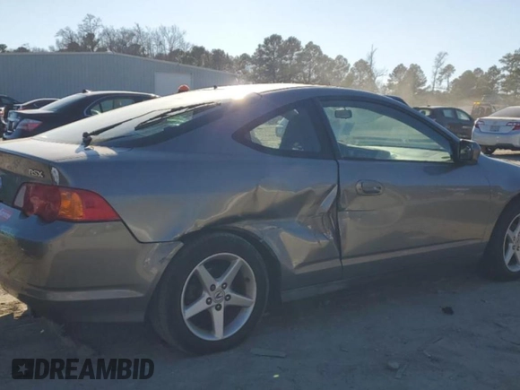 2003 Acura RSX z VIN JH4DC54853C017187, wystawiony jako Copart lot #86275604 z przebiegiem 176 244 mil mil oraz Szkoda całkowita • Salvage title. Historia ofert i sprzedaży dostępna na DreamBid. Obrazek 3.
