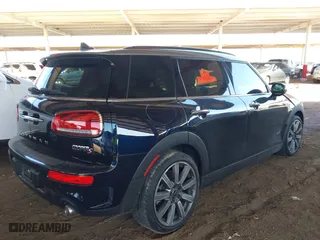 2023 MINI Clubman Cooper S with VIN WMWXJ1C07P2T62531, listed as a IAAI auction lot 41751201 with 27,343 mi miles. Bid and sale history available at carsss.com. Image 4.