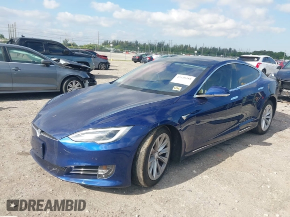 2017 Tesla Model S 100D with VIN 5YJSA1E28HF217489, listed as a IAAI auction lot 42128388 with Not provided miles and . Bid and sale history available at DreamBid. Image 2.