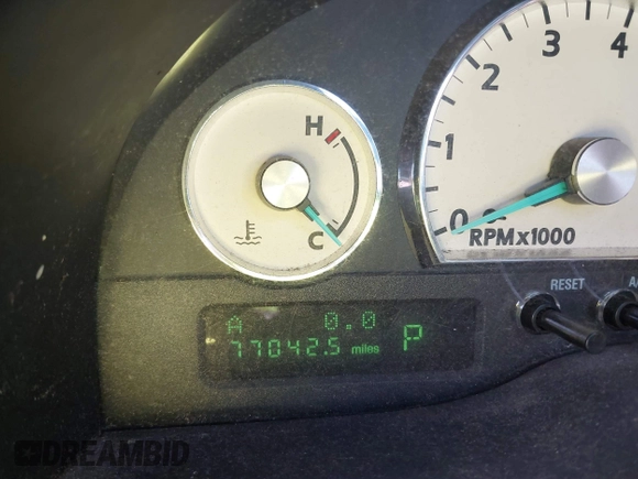 2004 Ford Thunderbird Deluxe with VIN 1FAHP60A34Y110824, listed as a IAAI auction lot 42155374 with 77,042 mi miles. Bid and sale history available at carsss.com. Image 7.