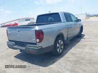 2018 Honda Ridgeline RTL z VIN 5FPYK2F5XJB001064, wystawiony jako IAAI lot #42252956 z przebiegiem 95 272 mil mil oraz . Historia ofert i sprzedaży dostępna na DreamBid. Obrazek 4.
