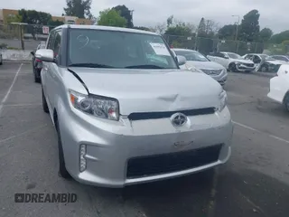 2014 Scion xB with VIN JTLZE4FE1EJ063231, listed as a IAAI auction lot 41881924 with 108,541 mi miles. Bid and sale history available at carsss.com. Image 1.