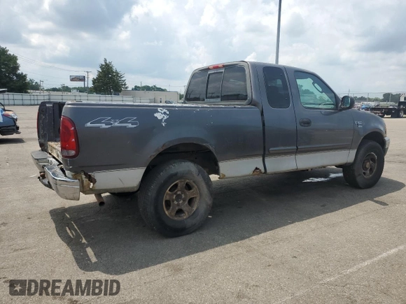 2004 Ford F-150 XL with VIN 2FTRX18W04CA42944, listed as a Copart auction lot 66496505 with 238,990 mi miles and Clean title. Bid and sale history available at DreamBid. Image 3.