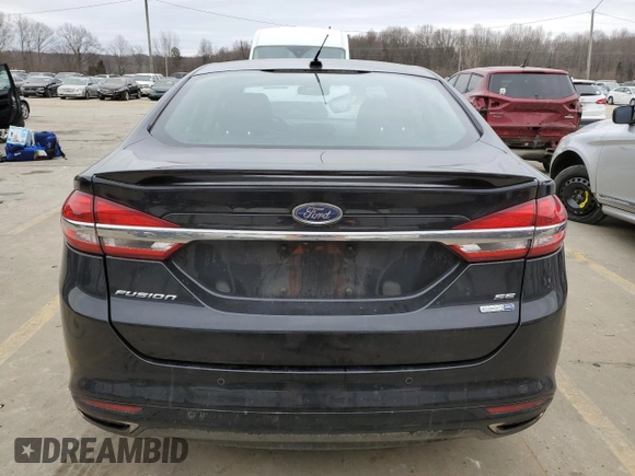 2018 Ford Fusion SE with VIN 3FA6P0T97JR133488, listed as a Copart auction lot 42704905 with 100,553 mi miles and Salvage Title. Bid and sale history available at carsss.com. Image 6.